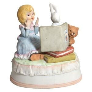 San Francisco Music Box Co Peter Rabbit Bedtime 
Porcelain Rotating Rabbit